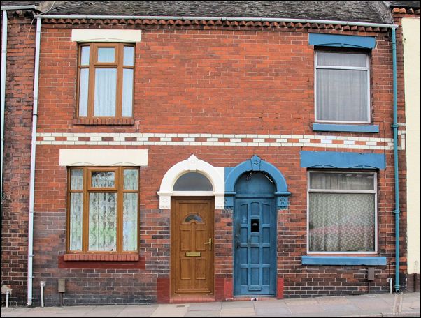 coloured banding on simple Potteries terraced housing