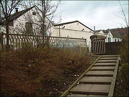 the path leads from a play area where the canal used to run