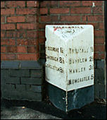 Milepost in High Street 