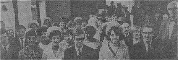 Pastor Harthern with members of the congregation.