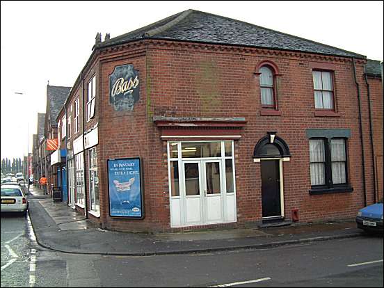 This shop was evidently a public house at one time.