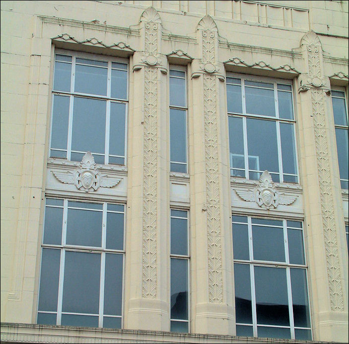 steel frame windows with emphasis on the vertical and geometric patterns 