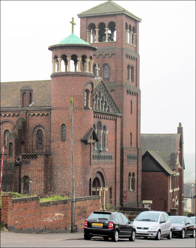 The two west towers; one square in plan and one smaller and round 