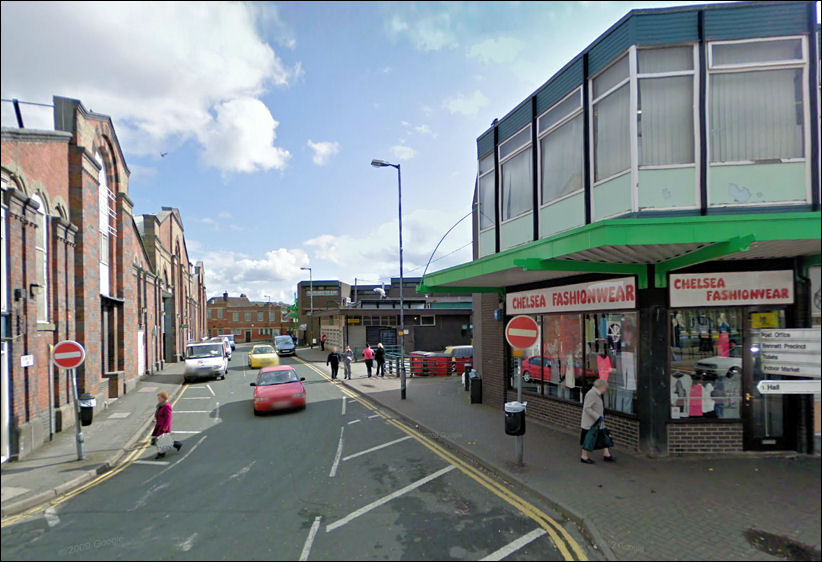 Transport Lane in 2012 - on the left the Indoor Market still stands, on the right a clothes shop replaces J.A. Baker, Fruitery & Florist,