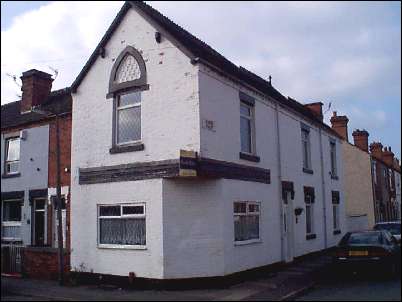 House on the corner of Burgess Street and Travers Street.