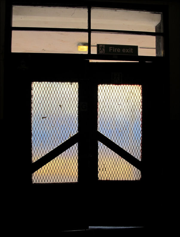 even this door in a dark corner has strong symetrical features 