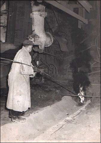 tapping the blast furnace - using an oxygen lance to remove the clay "plug" to start the flow of liquid iron