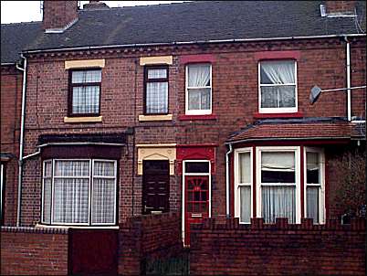 Terraced houses below 'Lime Tree Avenue'