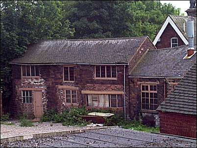 These buildings are to the right of the canal