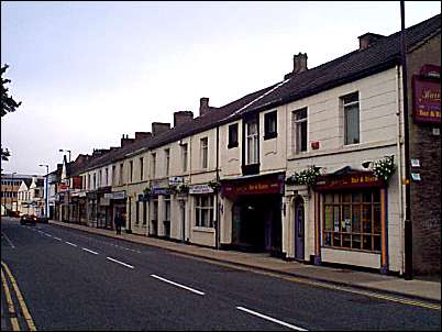 The block of 15 shops on Glebe Street (opposite St. Peter's Church)