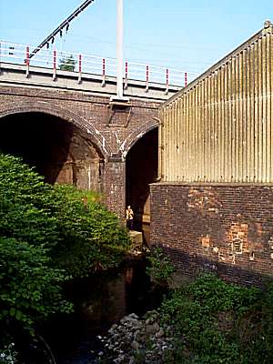 The river Trent as it flows under the railway bridge