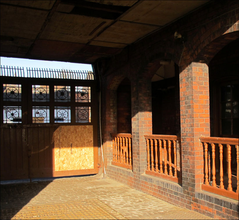 the entrance where the factory workers came in to clock on for their shift - through the gate is Port Street