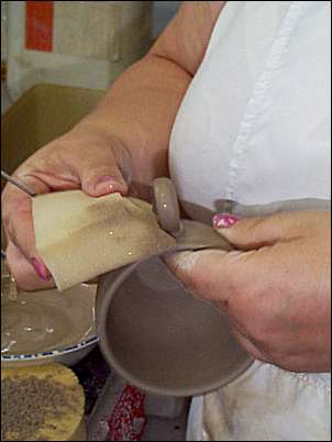 Sponging the joint between handle and cup