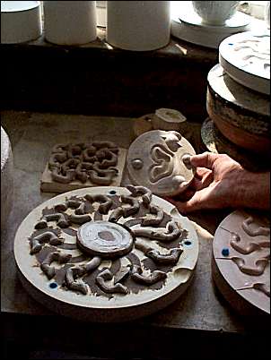 Handles in a plaster mould