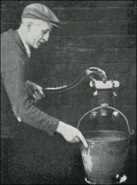 Mr Albert Sherratt, 100 Lord Street with the only remaining water pump, 