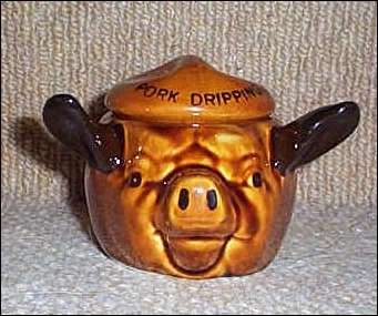 Hand painted, pottery pig by Szeiler. 