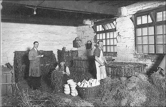 packing the ware with straw prior to shipping 