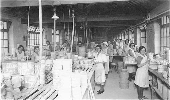 casting shop - clay slip is poured into the plaster of Paris moulds